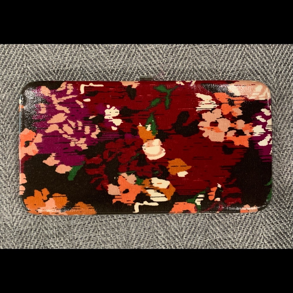 Clasp hinged wallet